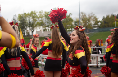 Crowd celebrating at homecoming game.