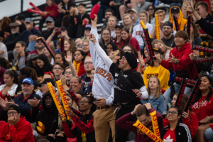 Crowd celebrating at homecoming game.