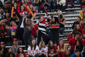 Crowd celebrating at homecoming game.