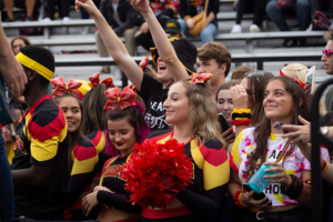 Crowd celebrating at homecoming game.