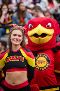 Crowd celebrating at homecoming game.