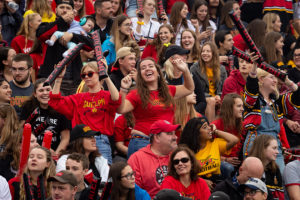 Crowd celebrating at homecoming game.