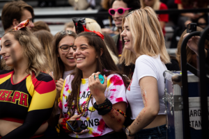 Crowd celebrating at homecoming game.