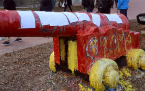 Red Canon covered In paper After it was vandalized | Tuesday