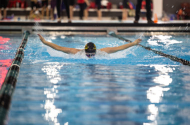 Mackenzie Faulkner during a butterfly race on Nov. 23.
