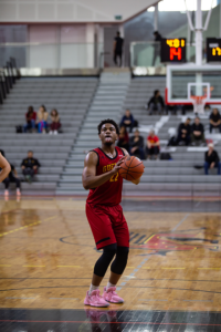 Rasheed Weekes, #22, winds up for a free throw on Nov 30.