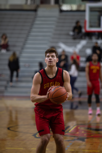 Kieran Naus, #21, winds up for a free throw on Nov 30.