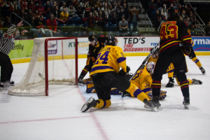 Laurier's goal net slides out of position during an a play.