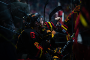 #21 sits on the bench in between his line's shift