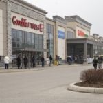 A line up of people at Zehrs (Eramosa Rd)