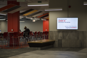 The Campus is nearly empty since students moved out and classes went online, but some students remain.